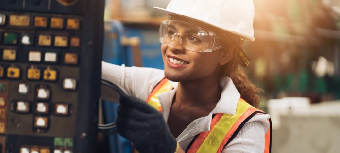 Woman in factory safety gear